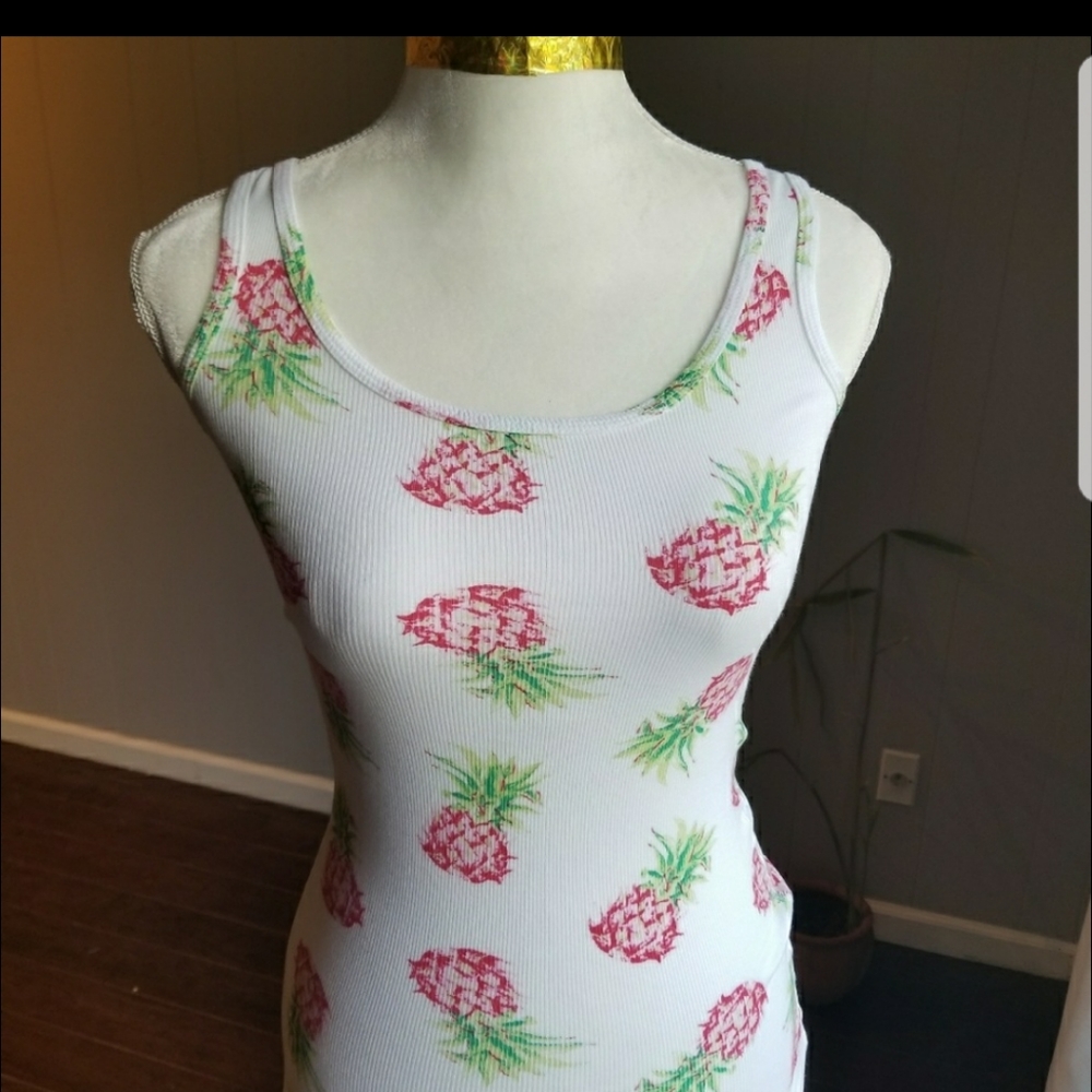 White tank with pineapples